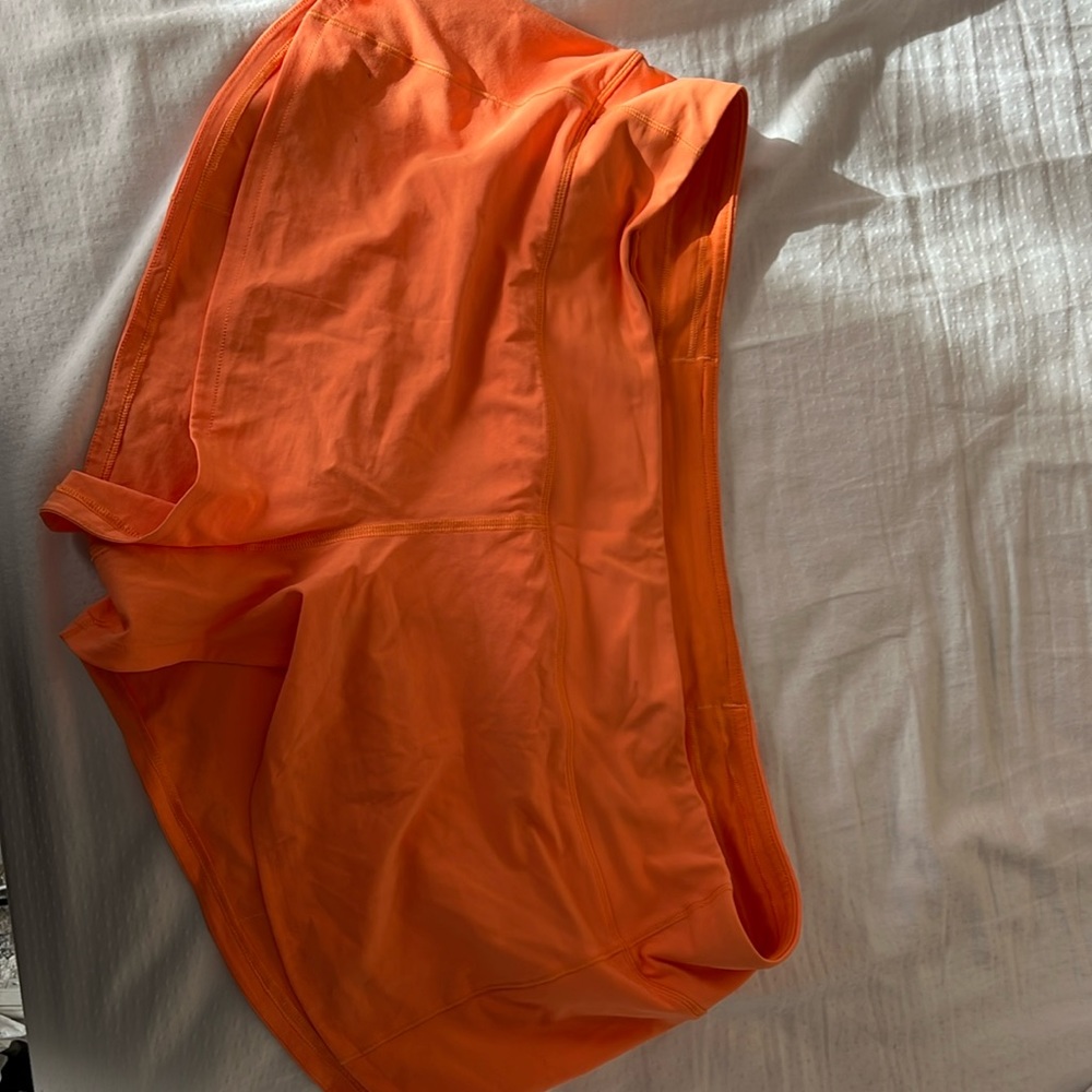 Lululemon speed up 2.5” shorts in orange. Size 12. Purchased like new